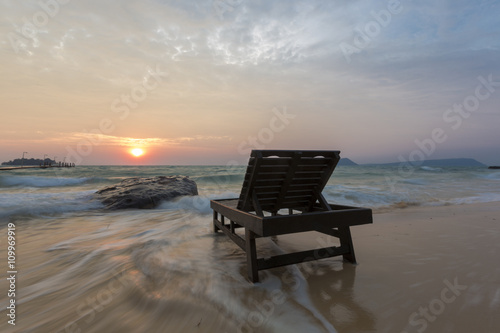 Empty beach with beach bed on sunrise in Koh Rong, Cambodia © piccaya