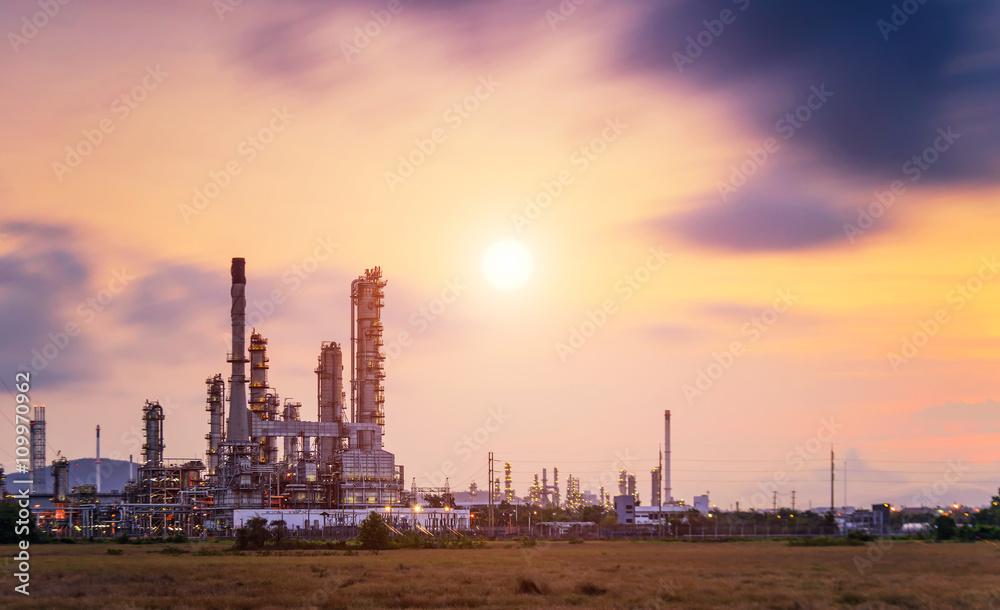 Big Industrial oil tanks in a refinery with treatment pond at industrial plants