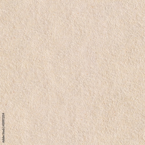 Seamless square texture. Old light brown (cream) paper texture.