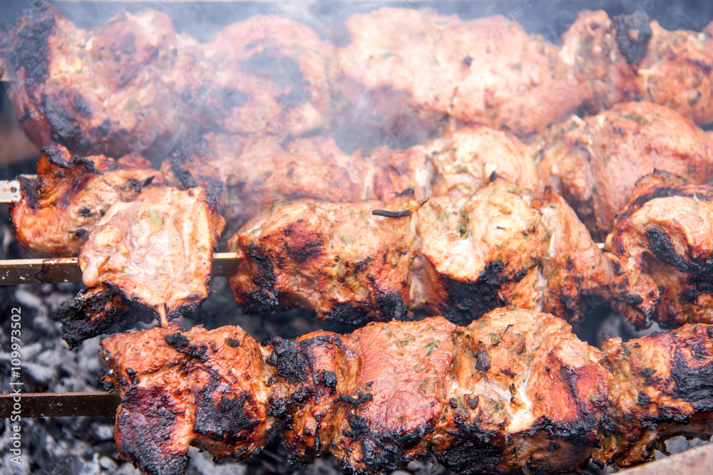 barbecue a shish kebab pork on skewers over charcoal barbecue a shish kebab pork on skewers over charcoal