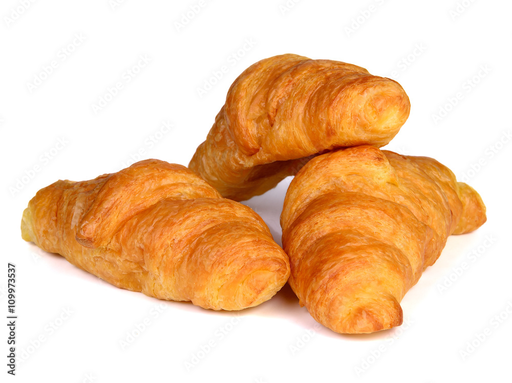 Fresh and tasty croissant over white background