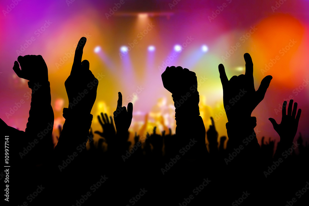 Fototapeta premium Concert crowd hands supporting band on stage
