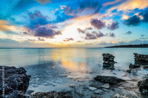 Sunset over a rocky shoreline on Eleuthera (Bahamas)