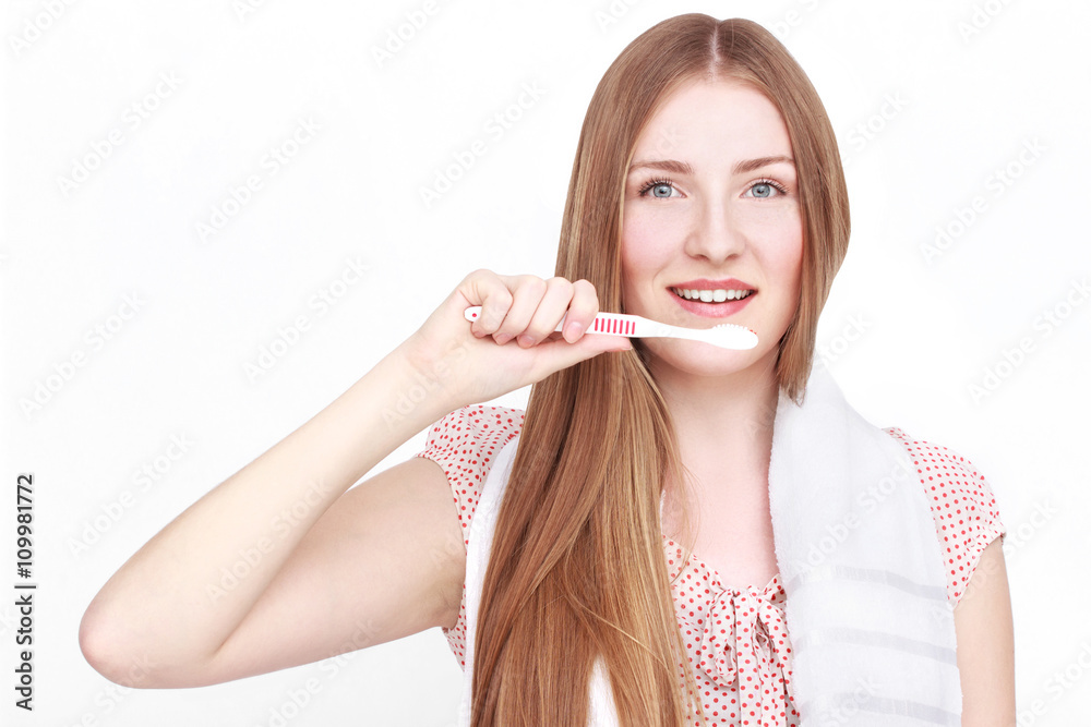 Woman with towel and toothbrush Woman with towel and toothbrush