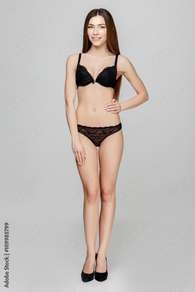 young beautiful caucasian woman wearing black lingerie young beautiful caucasian woman wearing black lingerie