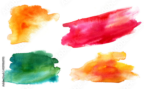 Set of vibrant yellow, green and red watercolor stains