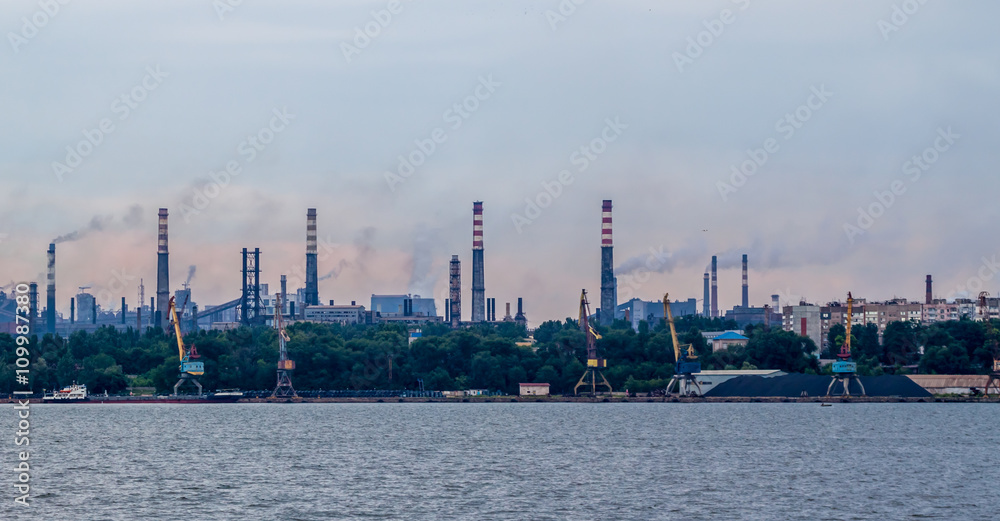 industrial landscape with pipes and smoke