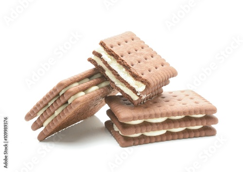 Biscuits with cream on white background