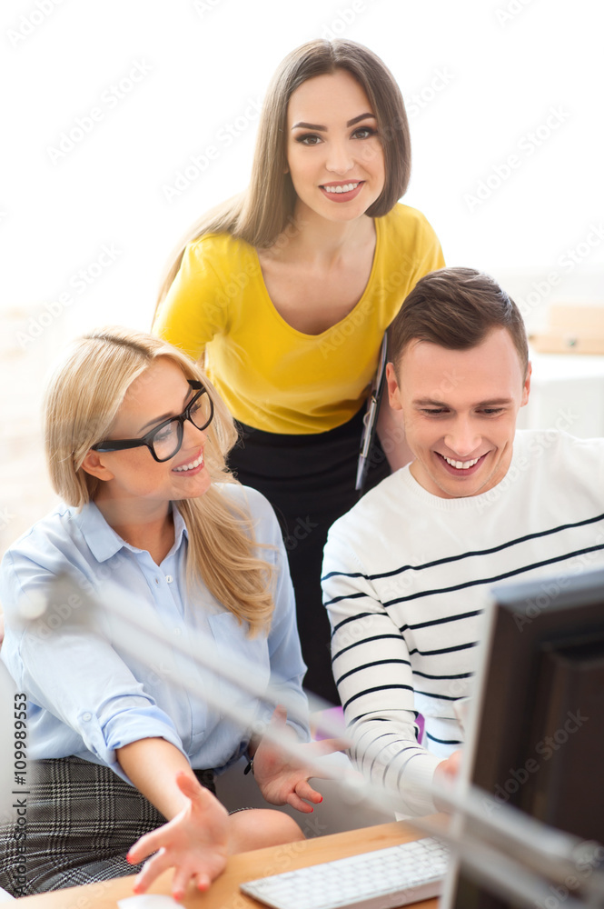 Positive colleagues using tablet Positive colleagues using tablet