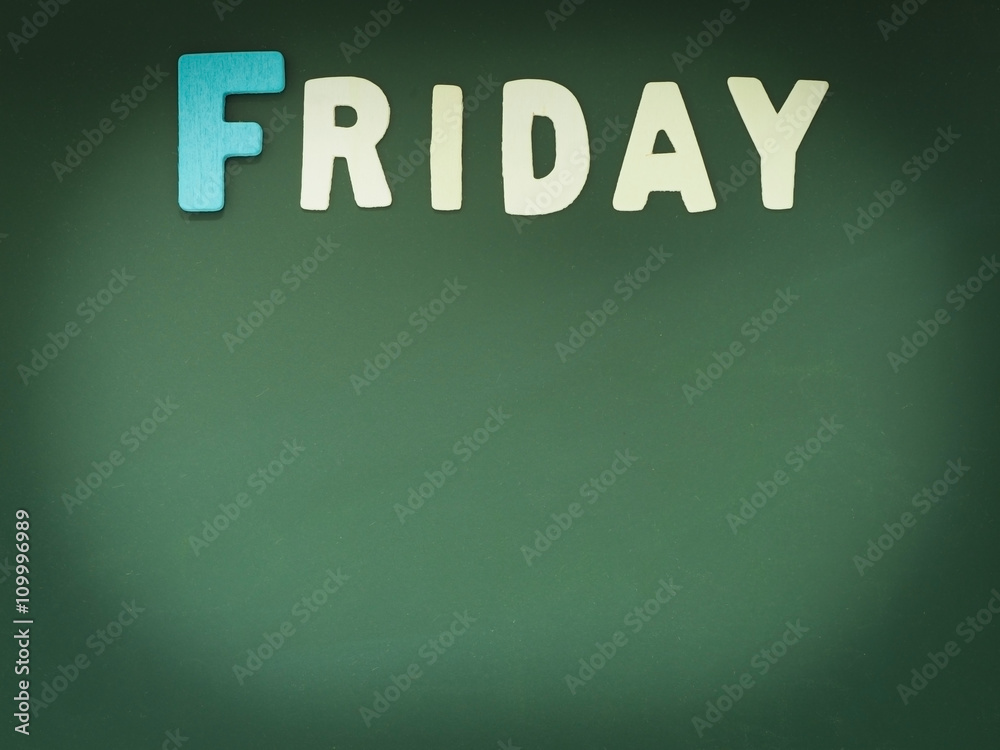 Wooden Friday on Green Board. Wood Friday word on blackboard with copy space. Wooden Friday on Green Board. Wood Friday word on blackboard with copy space.