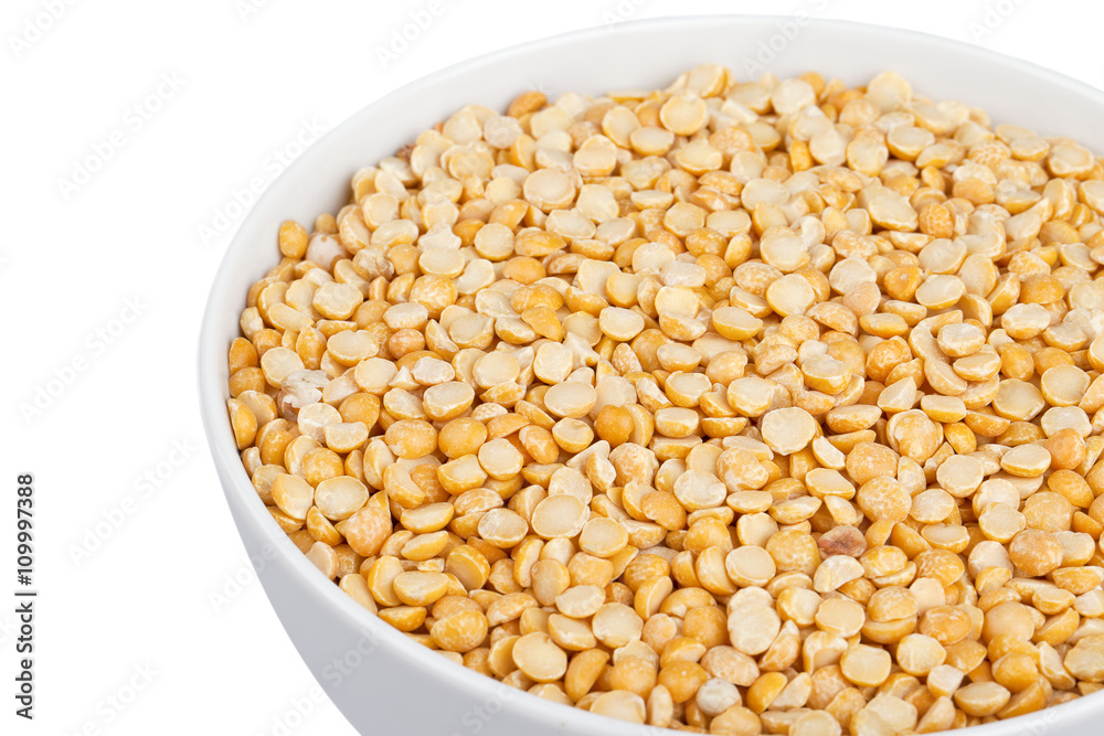 cropped image of yellow lentils in bowl.