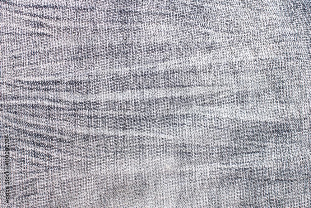 worn low blue jeans texture background closeup worn low blue jeans texture background closeup