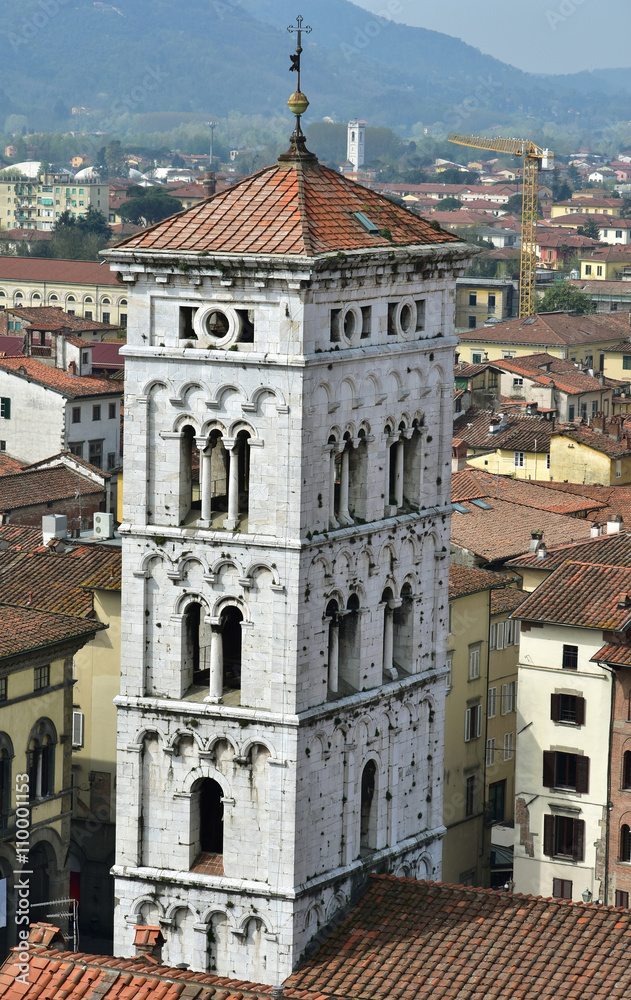 Fototapeta premium San Michele in Foro medieval bell tower in the historic center of Lucca