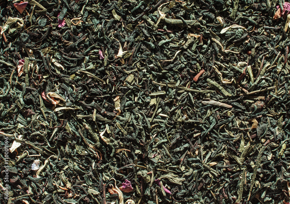 Dried green tea leaves background Dried green tea leaves background