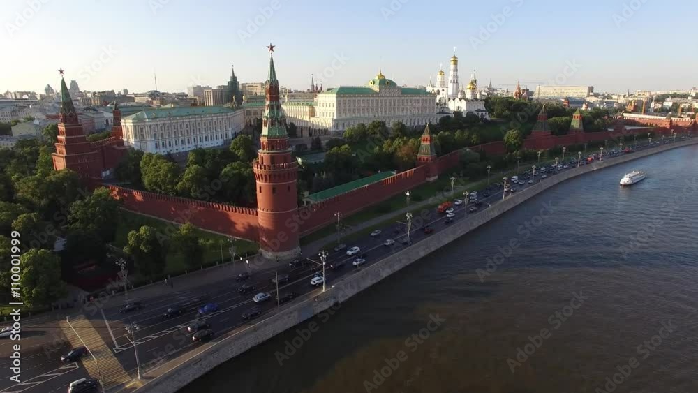 Flight over Moscow Kremlin near Red square. City center, downtown, river. Day road traffic. Unique aerial FPV Drone shot. High altitude. Warm sunset. UltraHD 4K Flight over Moscow Kremlin near Red square. City center, downtown, river. Day road traffic. Unique aerial FPV Drone shot. High altitude. Warm sunset. UltraHD 4K