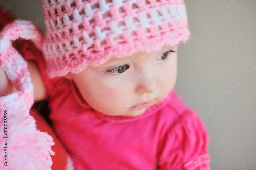 Adorable little baby girl sitting on the floor studio shot lovely portrait Adorable little baby girl sitting on the floor studio shot lovely portrait
