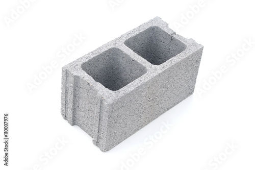 Gray concrete construction block isolated on white