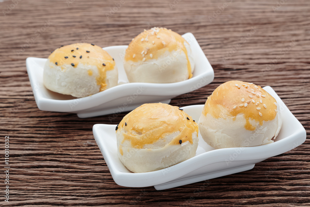 Chinese dessert with red envelope and gold ingots Chinese dessert with red envelope and gold ingots