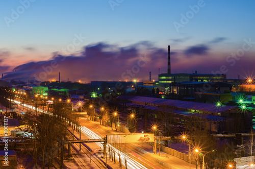 Night road in the industrial area of the city