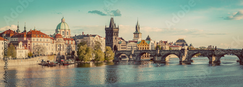 Prague, Czech Republic panorama with historic Charles Bridge and Vltava river. Vintage