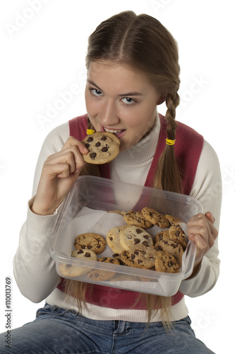 beautiful lady eating chocolate cookie