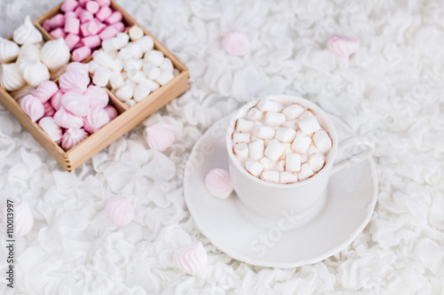 hot chocolate and marshmallow on a white background