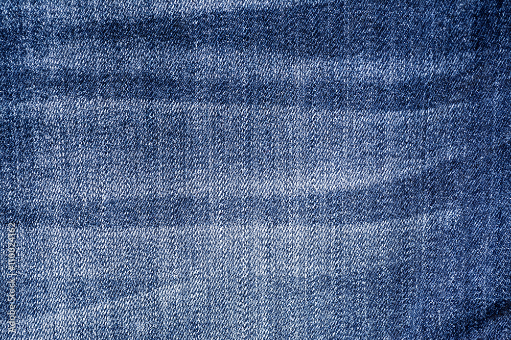 Dark blue jeans material texture background close up
Dark blue jeans material texture background close up