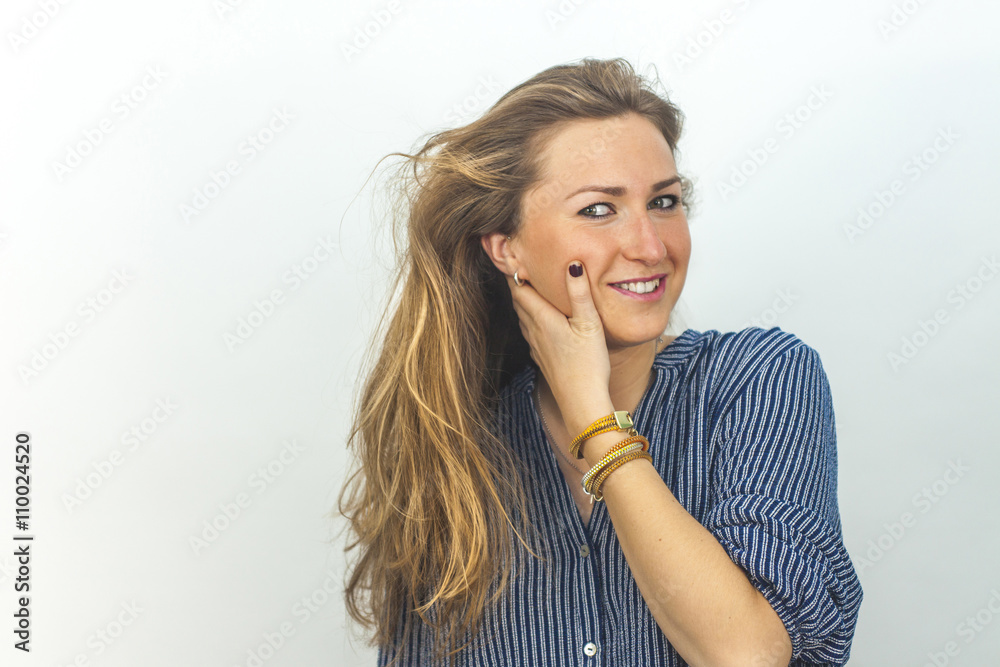 Close up portrait of smiling beautiful woman with hair motion sh Close up portrait of smiling beautiful woman with hair motion sh