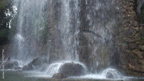 Wallpaper Mural Water poured on the stones. Around cascade green trees.  Torontodigital.ca