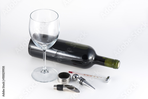 Red wine bottle and accessories