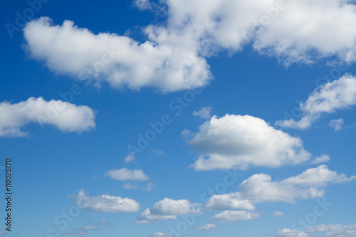 Blue sky and white clouds over horizon. © Gray wall studio