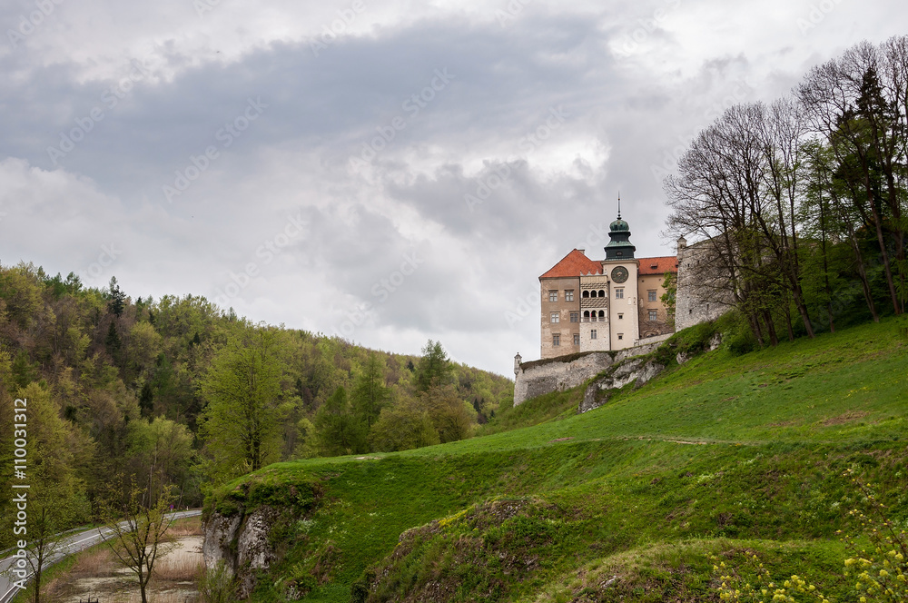 Renaissance castle in Pieskowa Skala on a cloudy day
