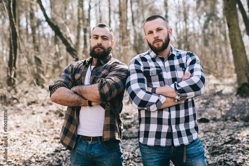 Bearded men working in the forest