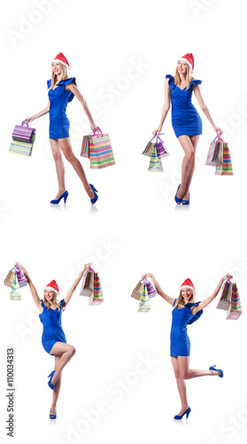 Woman with shopping bags isolated on white