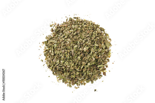 pile of dried tea leaves in white surface.