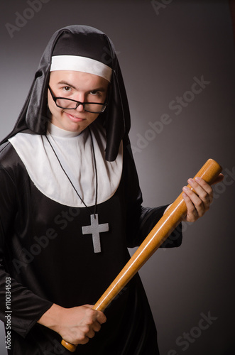 Funny man wearing nun clothing