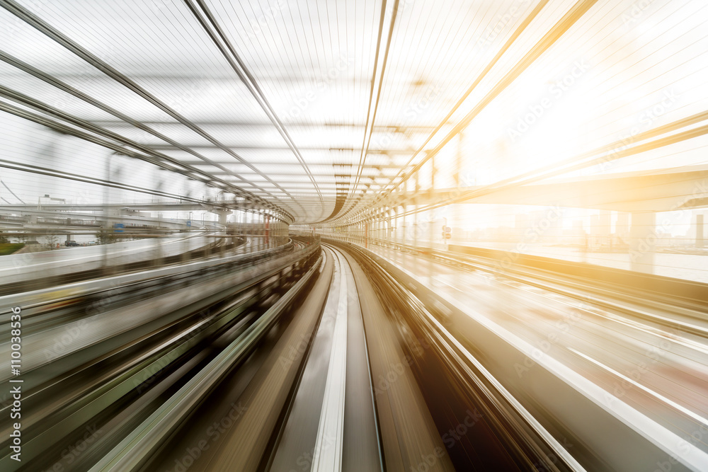 Light trail from moving train during evening