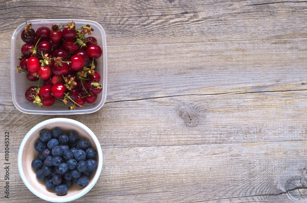 Berries on a wooden table in natural light Berries on a wooden table in natural light