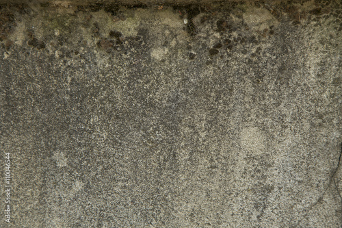 Grungy concrete wall all weathered in time