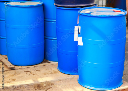 Some plastic blue barrels