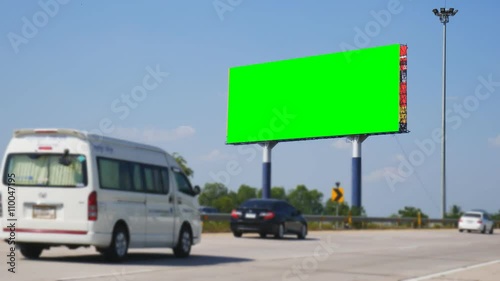 Green screen billboard with highway road