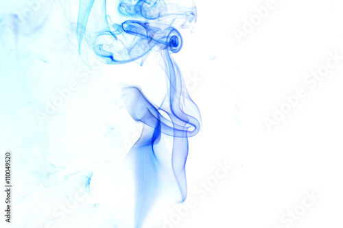 Abstract blue smoke from aromatic sticks.