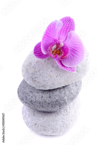 Stack of spa stones with flower 