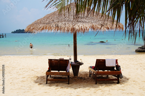 Two chairs and umbrella on tropical island  Cambodia    