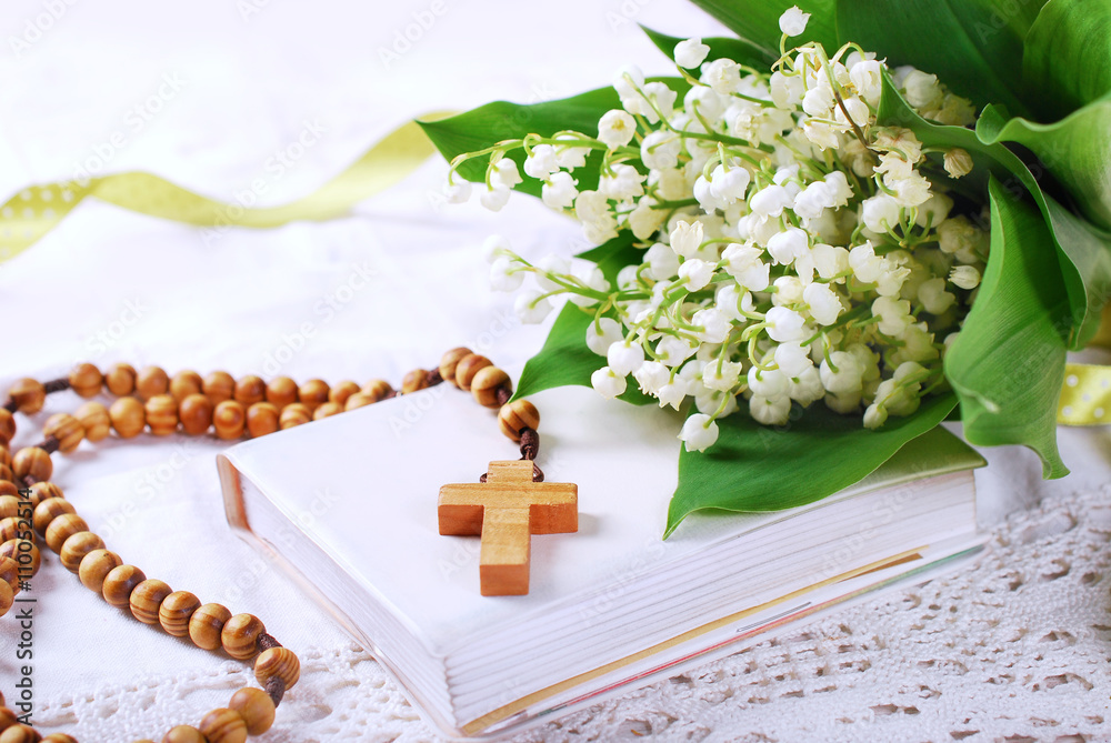 Naklejka premium the first holy communion with rosary and flowers