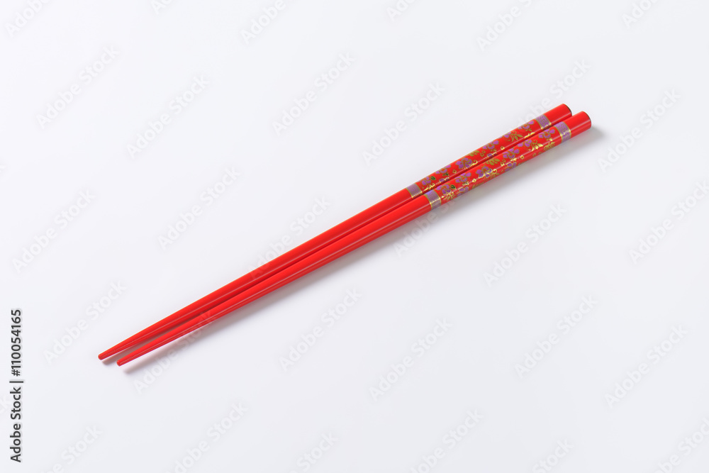 Red chopsticks with flower pattern Red chopsticks with flower pattern