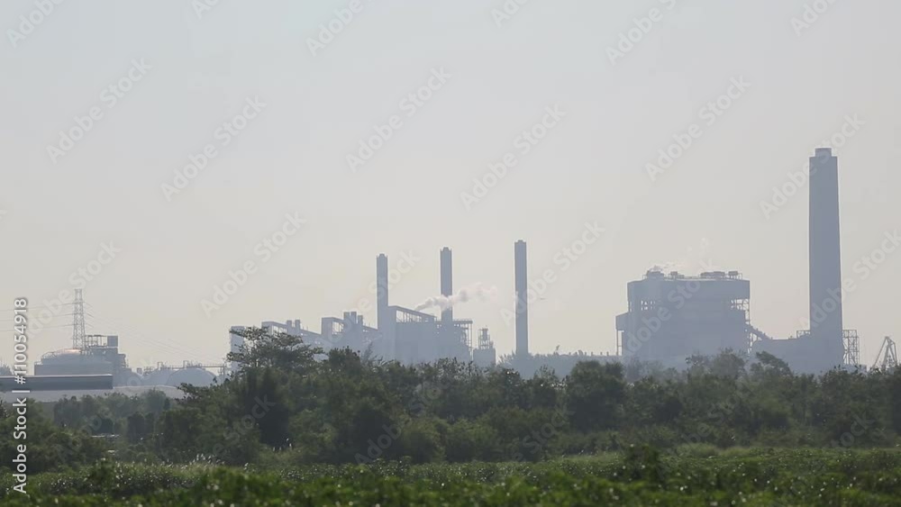 Smoke stack from Gas turbine power plant with cloud sky Smoke stack from Gas turbine power plant with cloud sky
