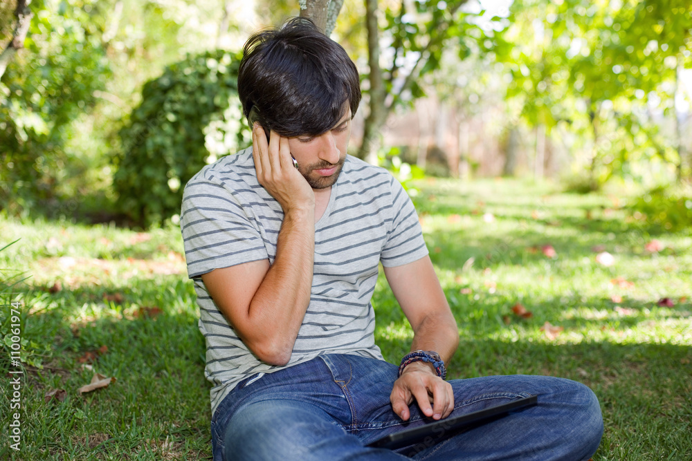 man relaxing with tablet pc man relaxing with tablet pc