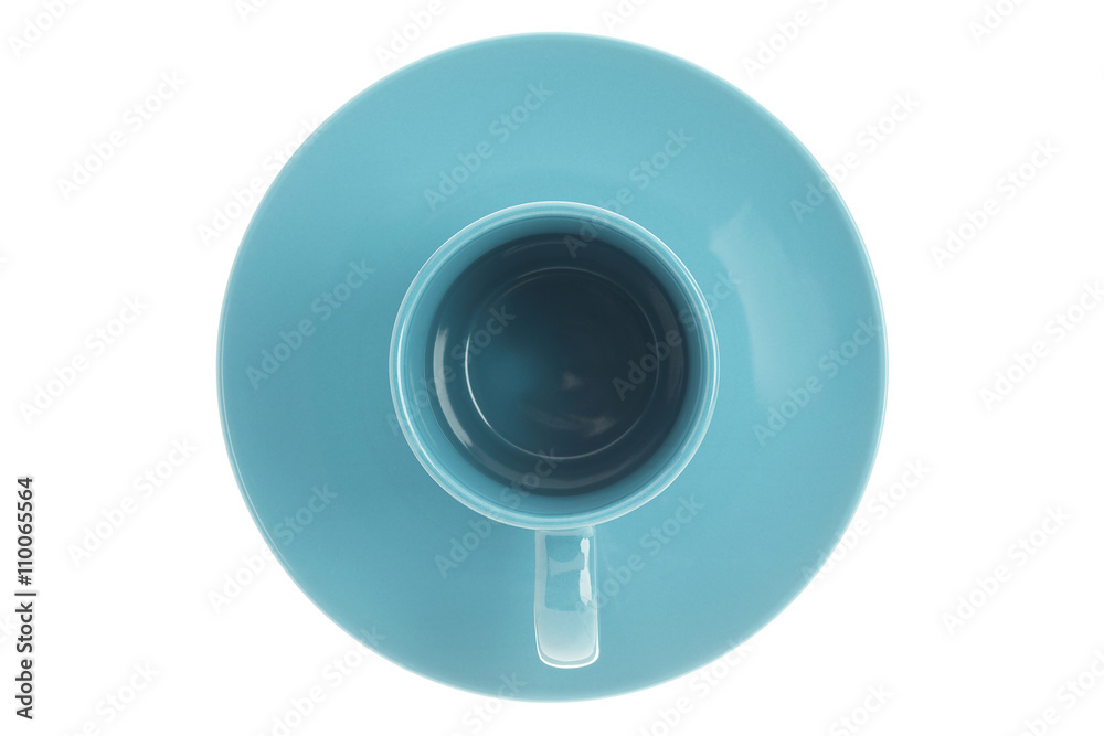 mug and saucer on blue mug and saucer on blue