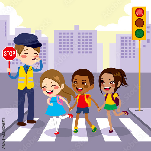 Three cute little school children students crossing street walking through pedestrian crossing with help from male cop holding stop sign